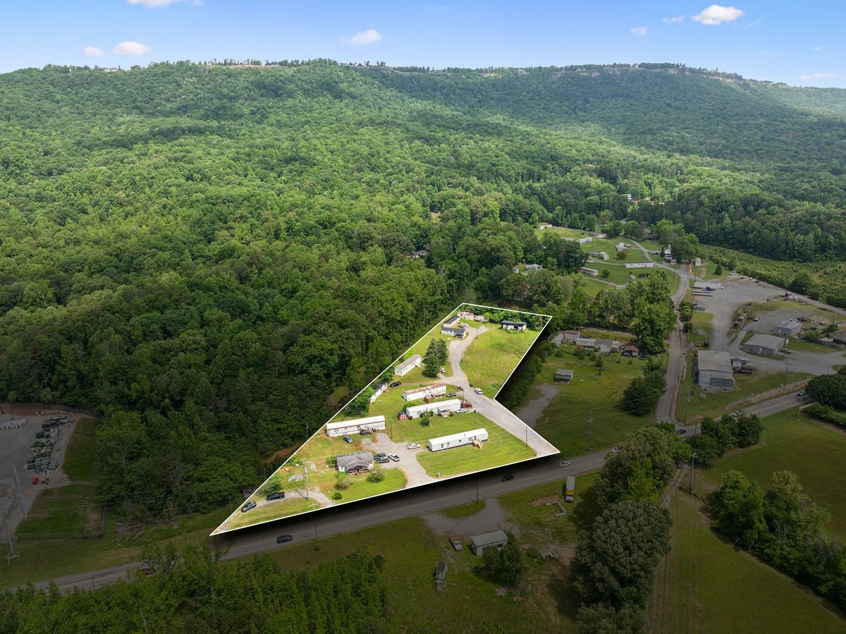Aerial view with the property's approximate boundary outlined in white