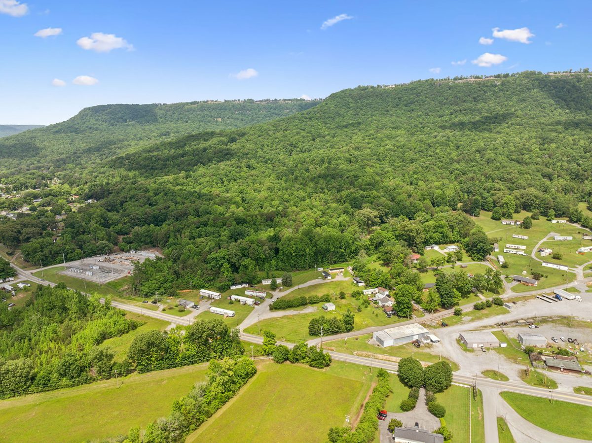 Aerial view of the community and neighboring parcels from the south