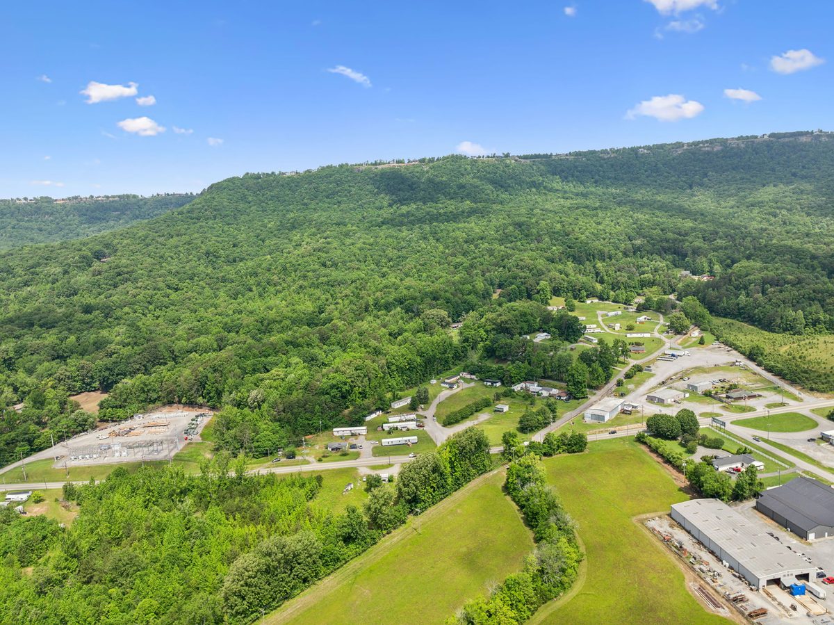 Aerial view over the community toward the valley and plateau ridgeline