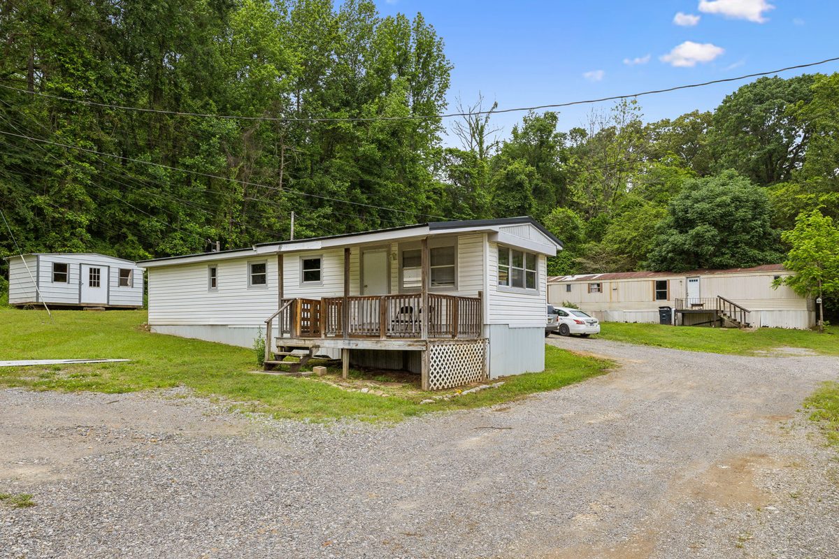 Park-owned home with covered front porch