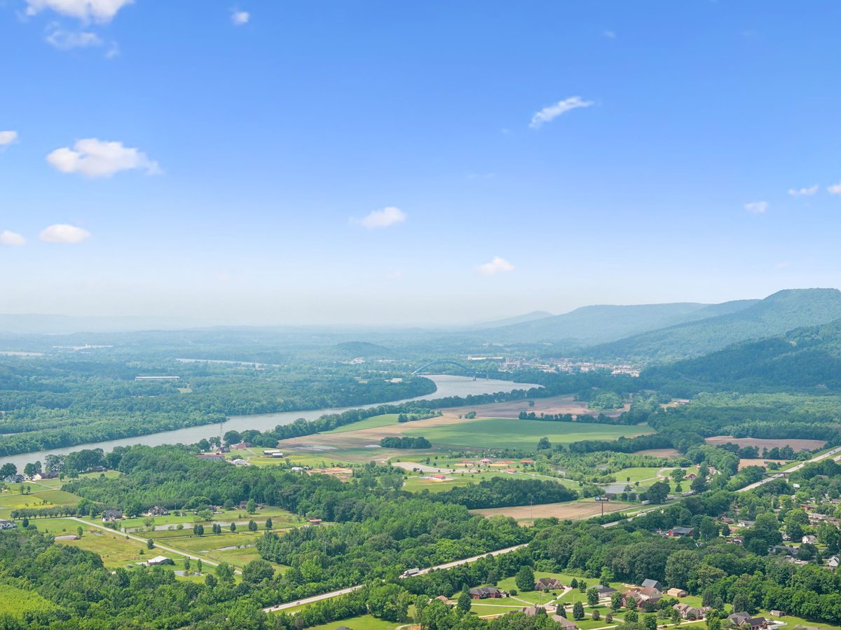 High aerial view toward the Tennessee River and surrounding mountains