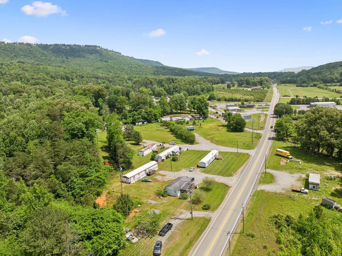 Aerial view along US Highway 41 through Kimball, Tennessee, with homes of the community visible at left
